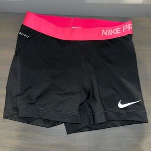 MEDIUM black and pink Nike pro shorts